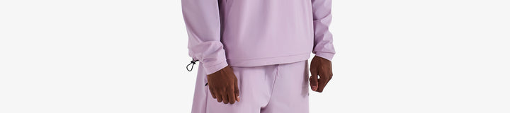 PERFORMANCE QUARTER ZIP SHELL PULLOVER