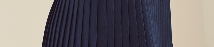 STUDIO SEOUL WRAP PLEATED SKIRT