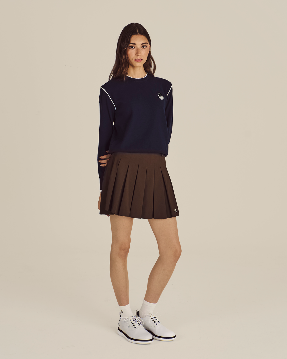 STUDIO SEOUL HIGH-LOW PLEATED SKIRT