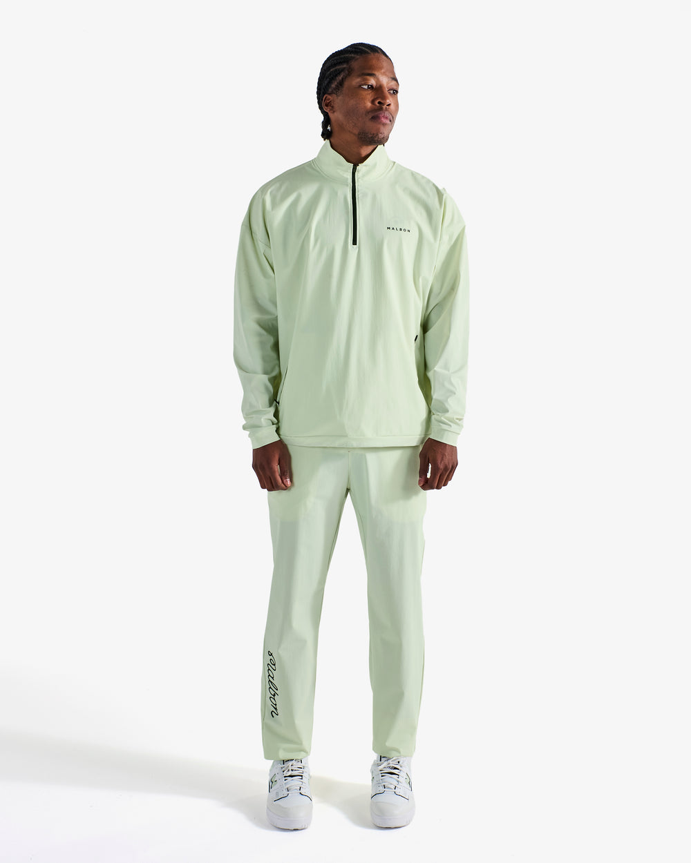 PERFORMANCE QUARTER ZIP SHELL PULLOVER