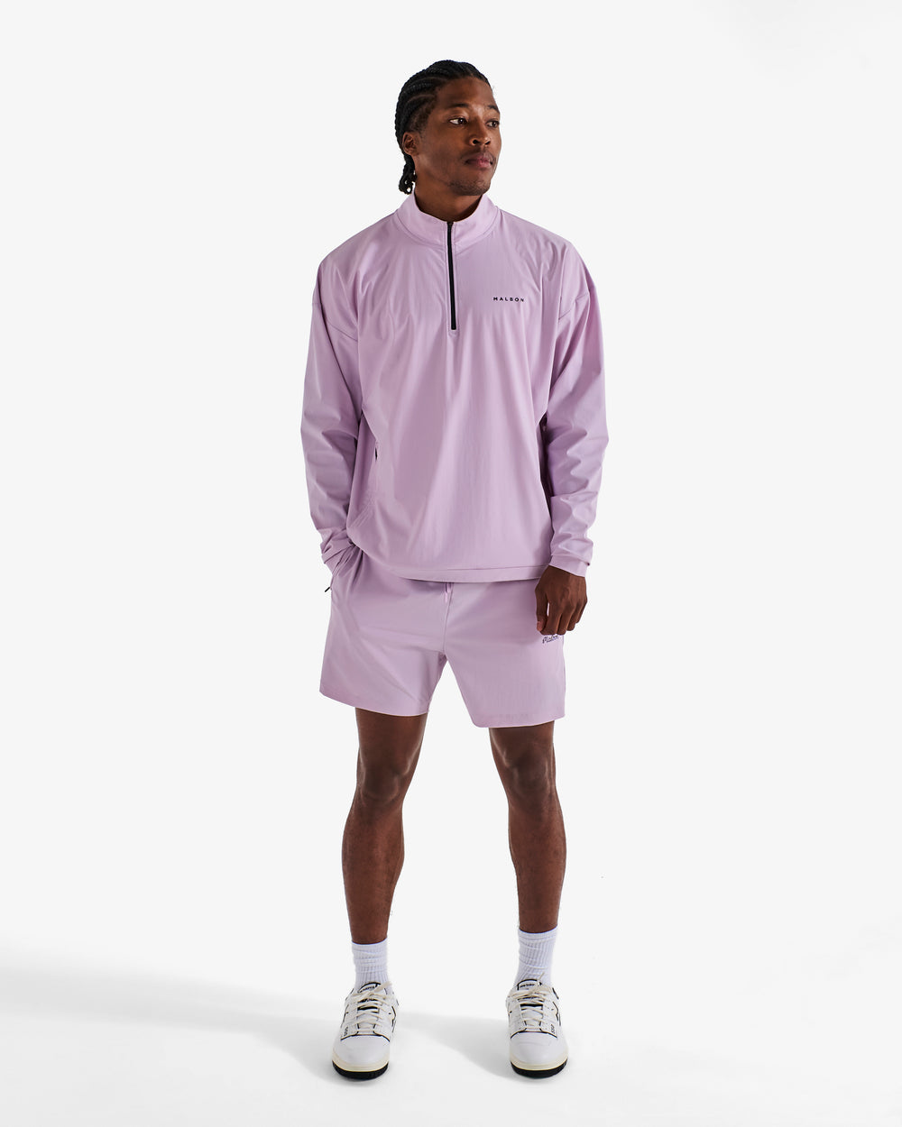PERFORMANCE QUARTER ZIP SHELL PULLOVER