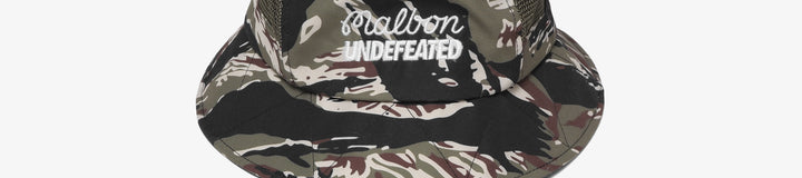 MALBON X UNDEFEATED BUCKET HAT