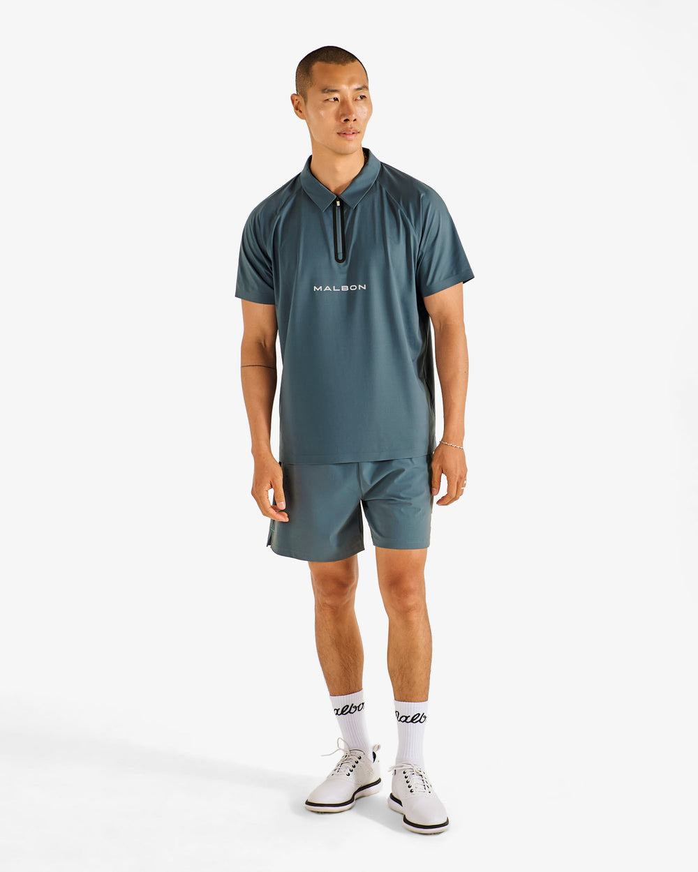 PERFORMANCE ZIP RAGLAN POLO