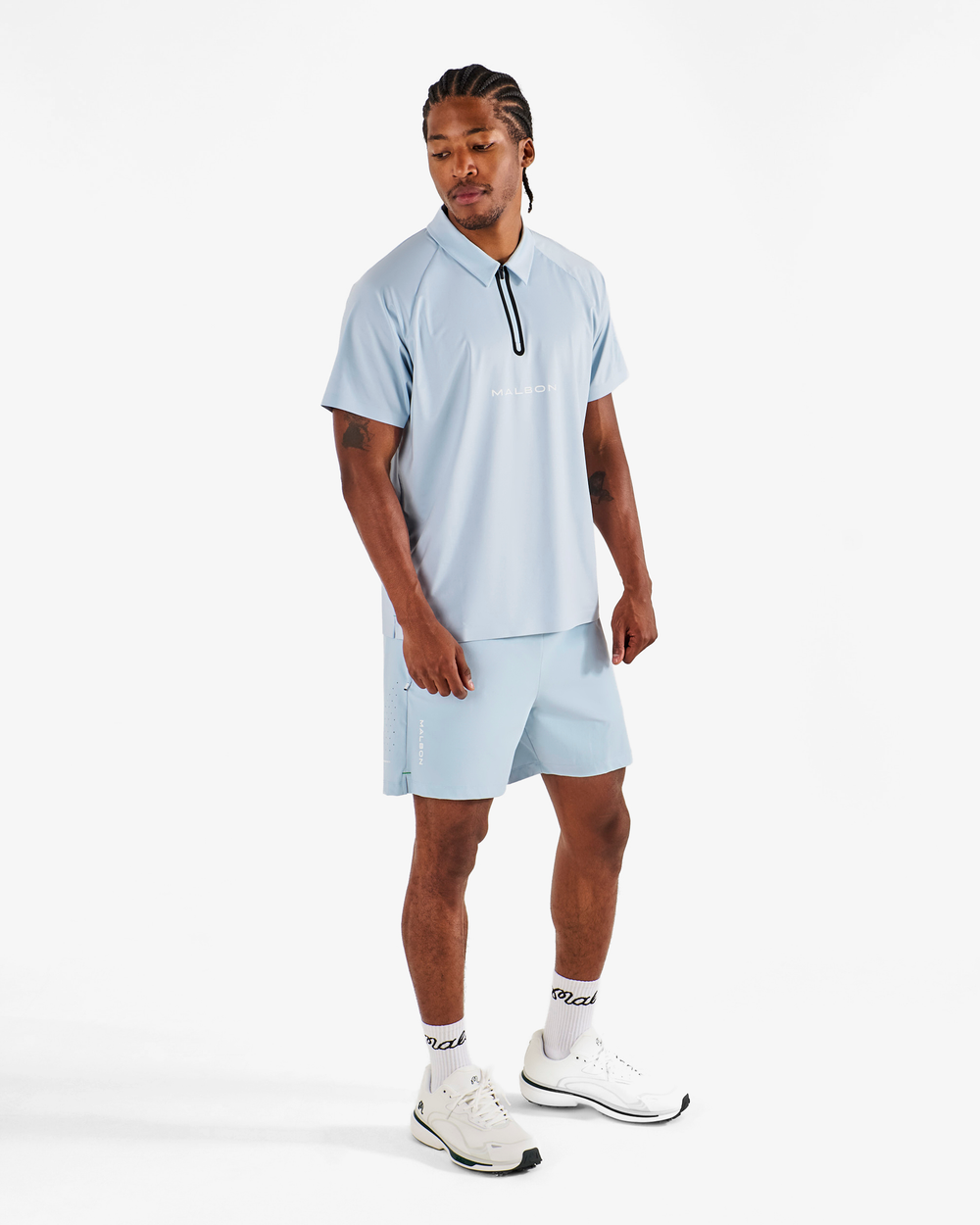 PERFORMANCE ZIP RAGLAN POLO