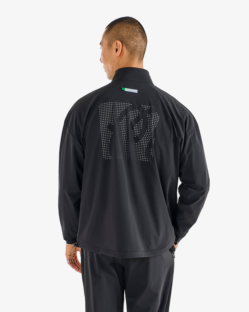 PERFORMANCE QUARTER ZIP SHELL PULLOVER