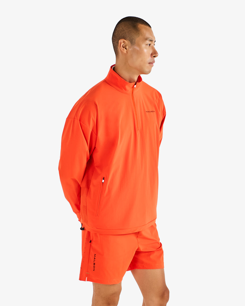PERFORMANCE QUARTER ZIP SHELL PULLOVER
