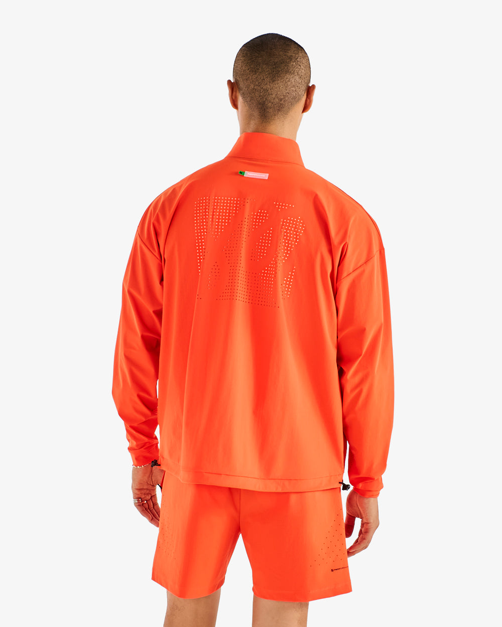 PERFORMANCE QUARTER ZIP SHELL PULLOVER