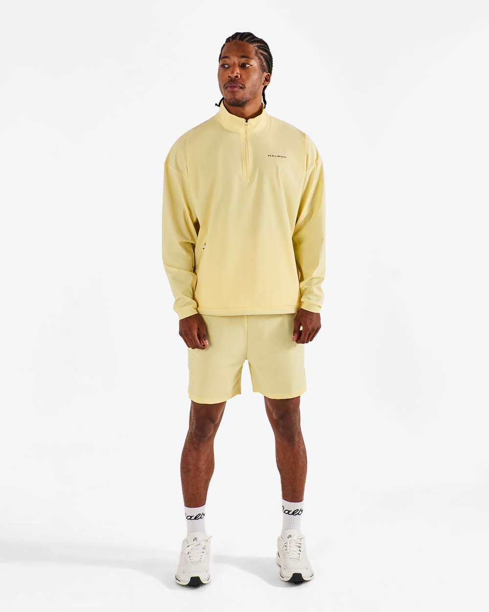 PERFORMANCE QUARTER ZIP SHELL PULLOVER
