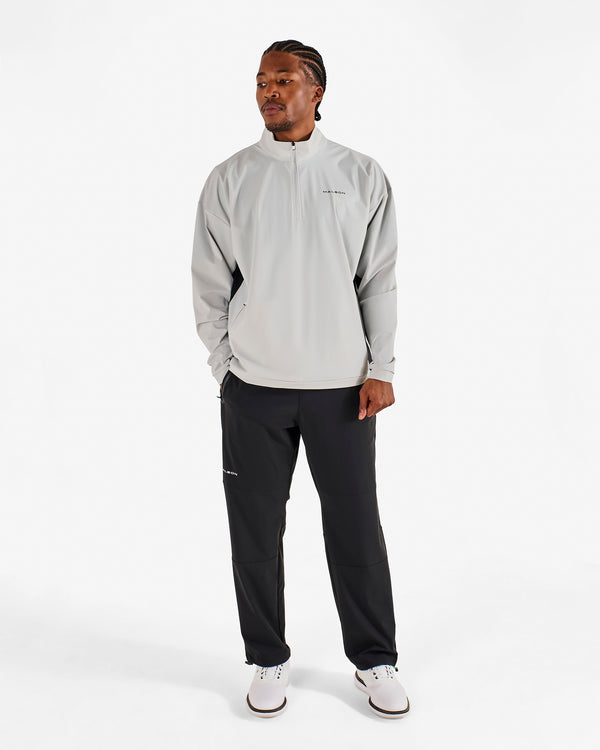 PERFORMANCE QUARTER ZIP SHELL PULLOVER