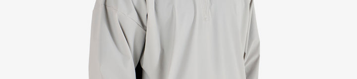 PERFORMANCE QUARTER ZIP SHELL PULLOVER