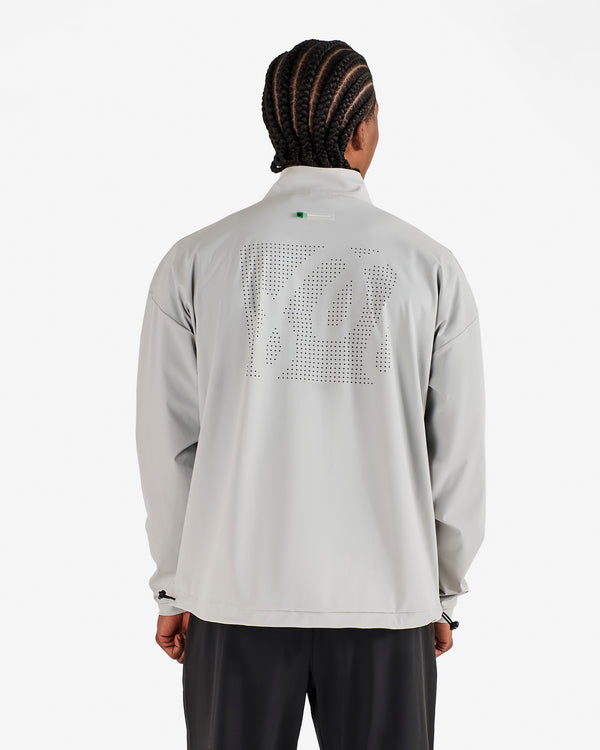 PERFORMANCE QUARTER ZIP SHELL PULLOVER