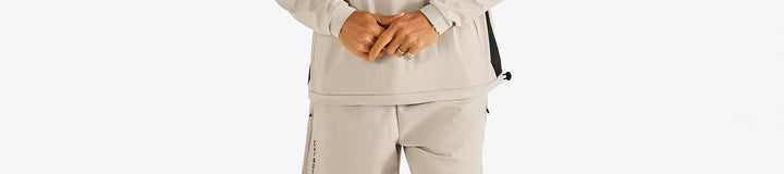 PERFORMANCE QUARTER ZIP SHELL PULLOVER