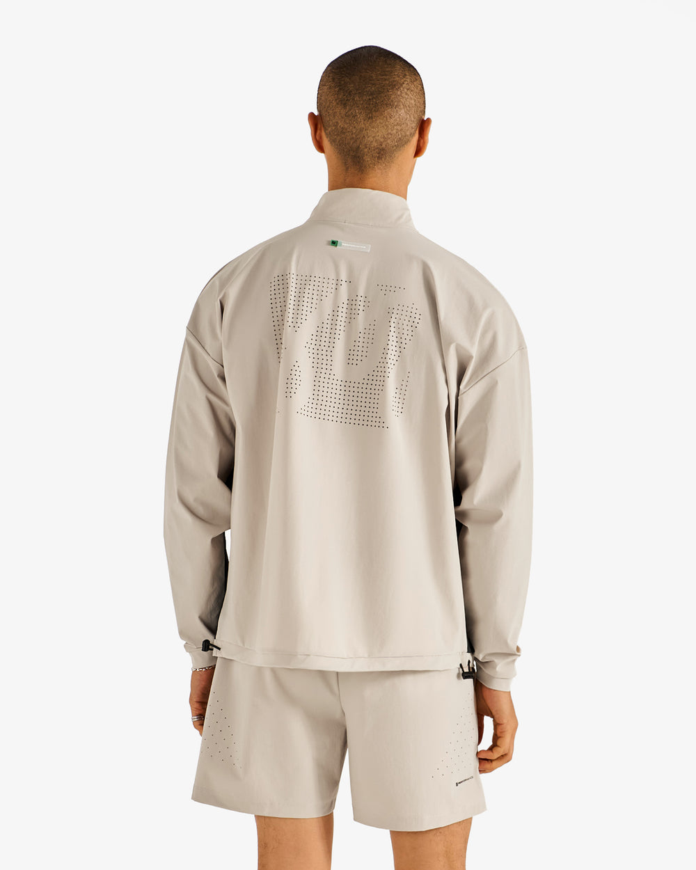 PERFORMANCE QUARTER ZIP SHELL PULLOVER