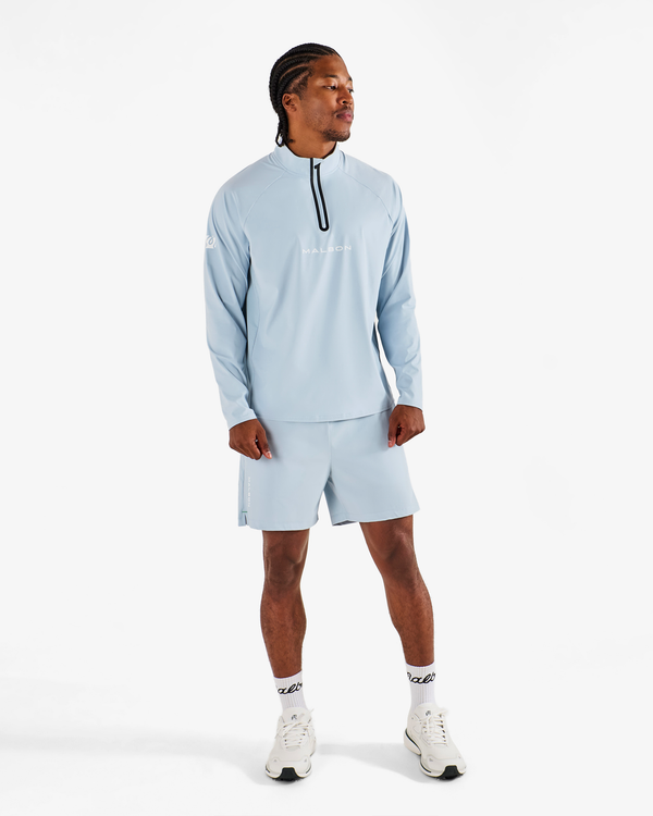 PERFORMANCE RAGLAN QUARTER ZIP