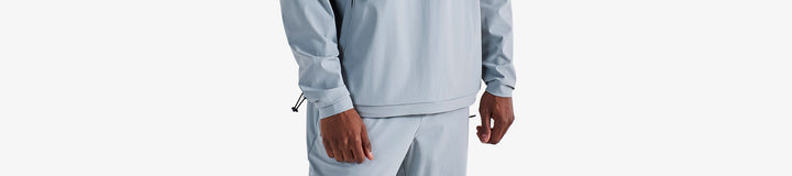 PERFORMANCE QUARTER ZIP SHELL PULLOVER