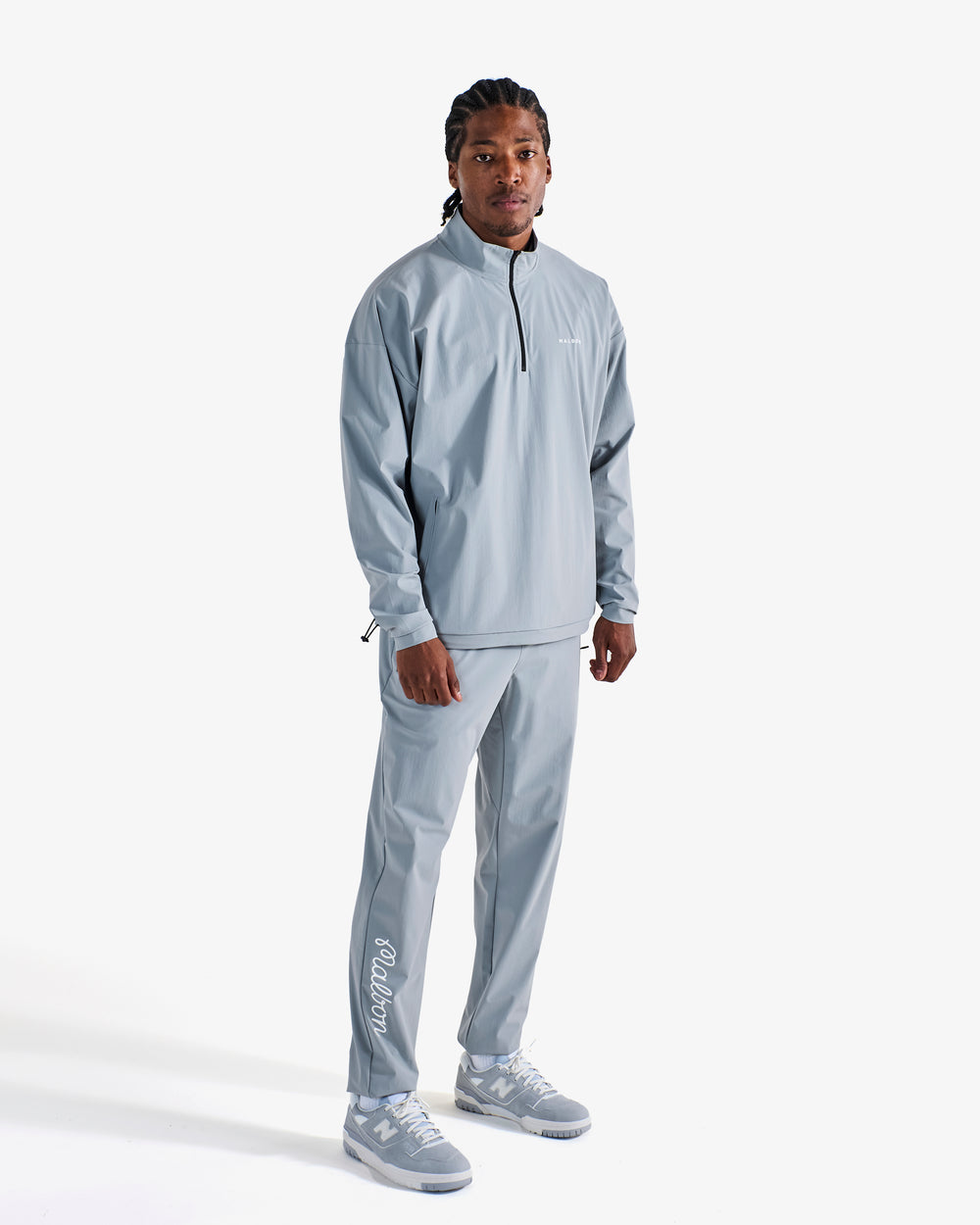 PERFORMANCE QUARTER ZIP SHELL PULLOVER