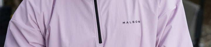 PERFORMANCE QUARTER ZIP SHELL PULLOVER